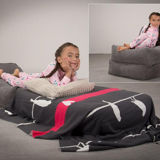 LOUNGE PUG, Avery – Futonstol Enkelsäng, Pom-pom Mörkgrå